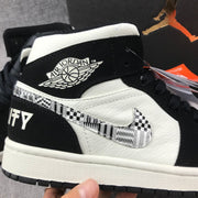 Air Jordan 1 Mid Black History Month Sneakers 852542-010