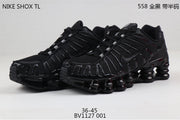 Nike Shox TL Sneakers in Black and Gold