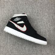 Air Jordan 1 Mid Black, White & Red Sneakers 554724-060