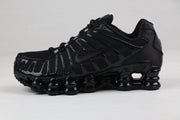 Nike Shox TL Sneakers in Black and Gold