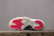 Air Jordan 11 Retro Low Pink Snakeskin Women's Sneakers