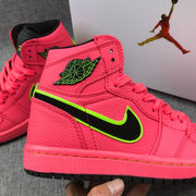 Air Jordan 1 Mid Sneakers in Pink and Black AQ9131-600
