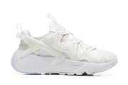 Nike Air Huarache Run Sneakers in White and Pale Blue