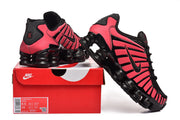 Nike Shox TL Sneakers in Black and Pink