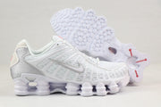 Nike Shox TL Sneakers in Black and Gold